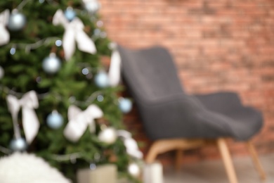 Blurred view of stylish living room interior with decorated Christmas tree