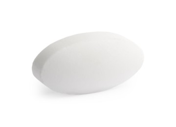 Photo of One pill on white background. Medicinal treatment