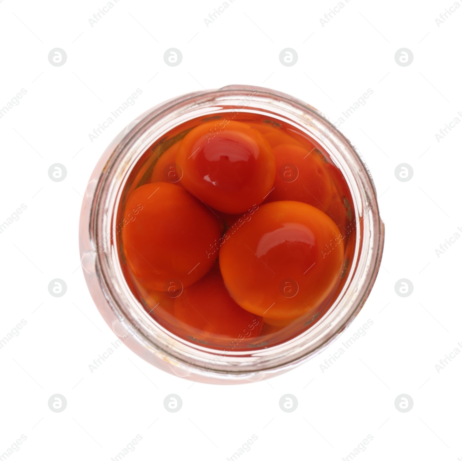 Photo of Jar of pickled tomatoes isolated on white, top view