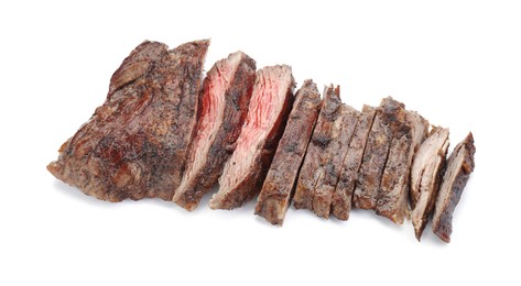 Photo of Pieces of tasty grilled beef meat isolated on white