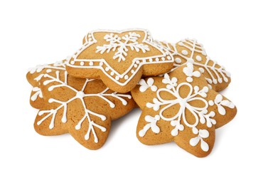 Photo of Tasty star shaped Christmas cookies with icing isolated on white