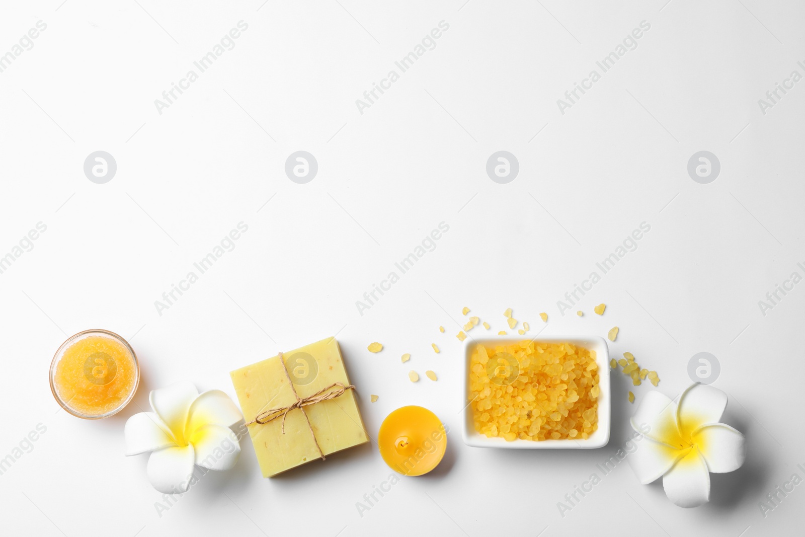 Photo of Flat lay spa composition with aromatic salt, handmade soap and space for text on white background