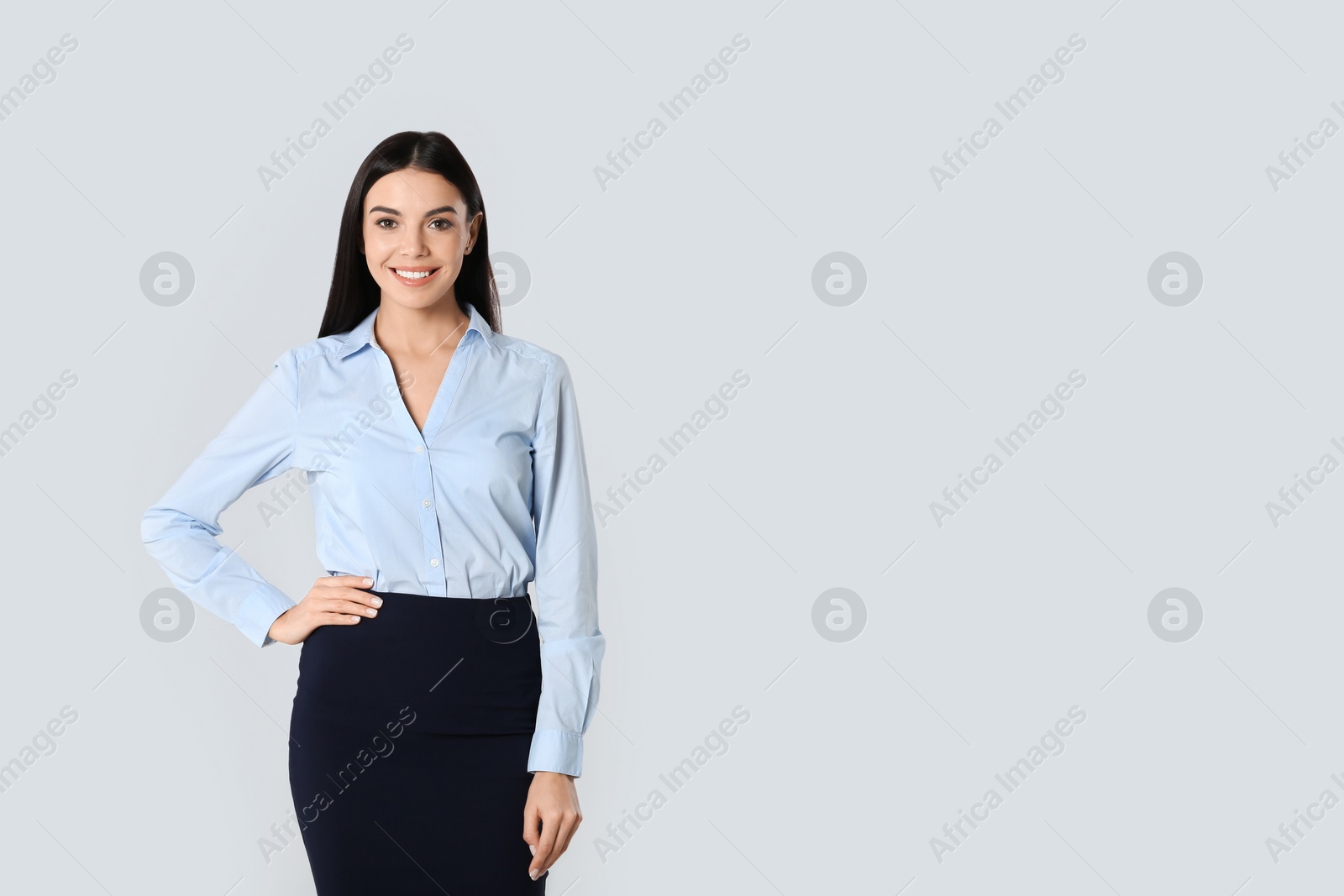 Photo of Portrait of young businesswoman on white background. Space for text