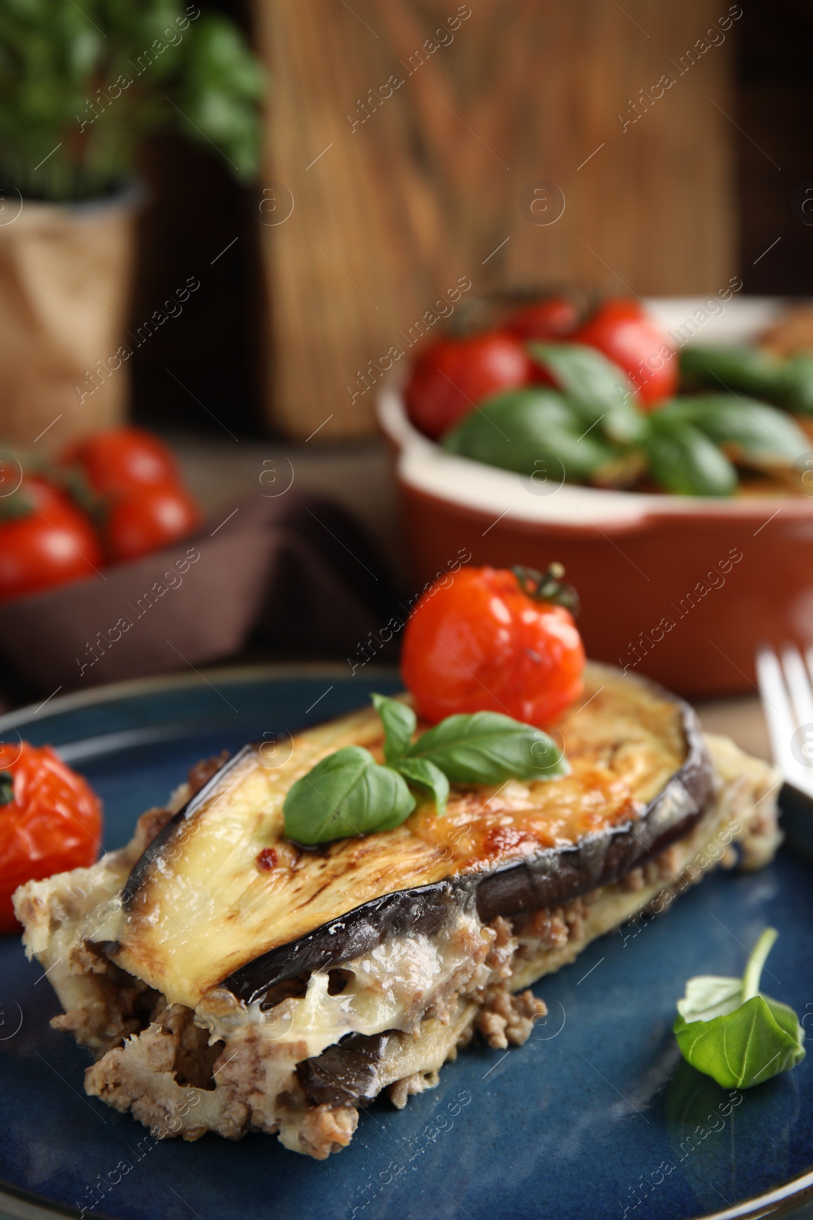 Photo of Plate of delicious eggplant lasagna on table