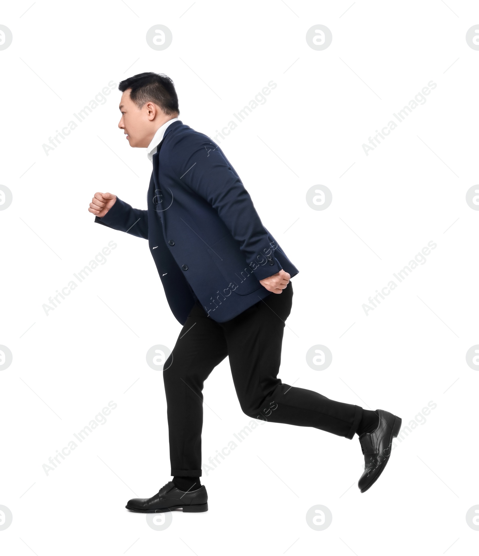 Photo of Businessman in suit running on white background