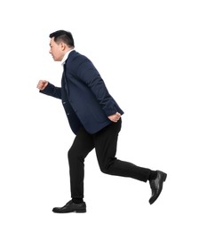 Businessman in suit running on white background