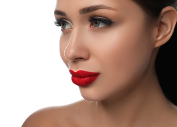 Woman with red lipstick on white background, closeup