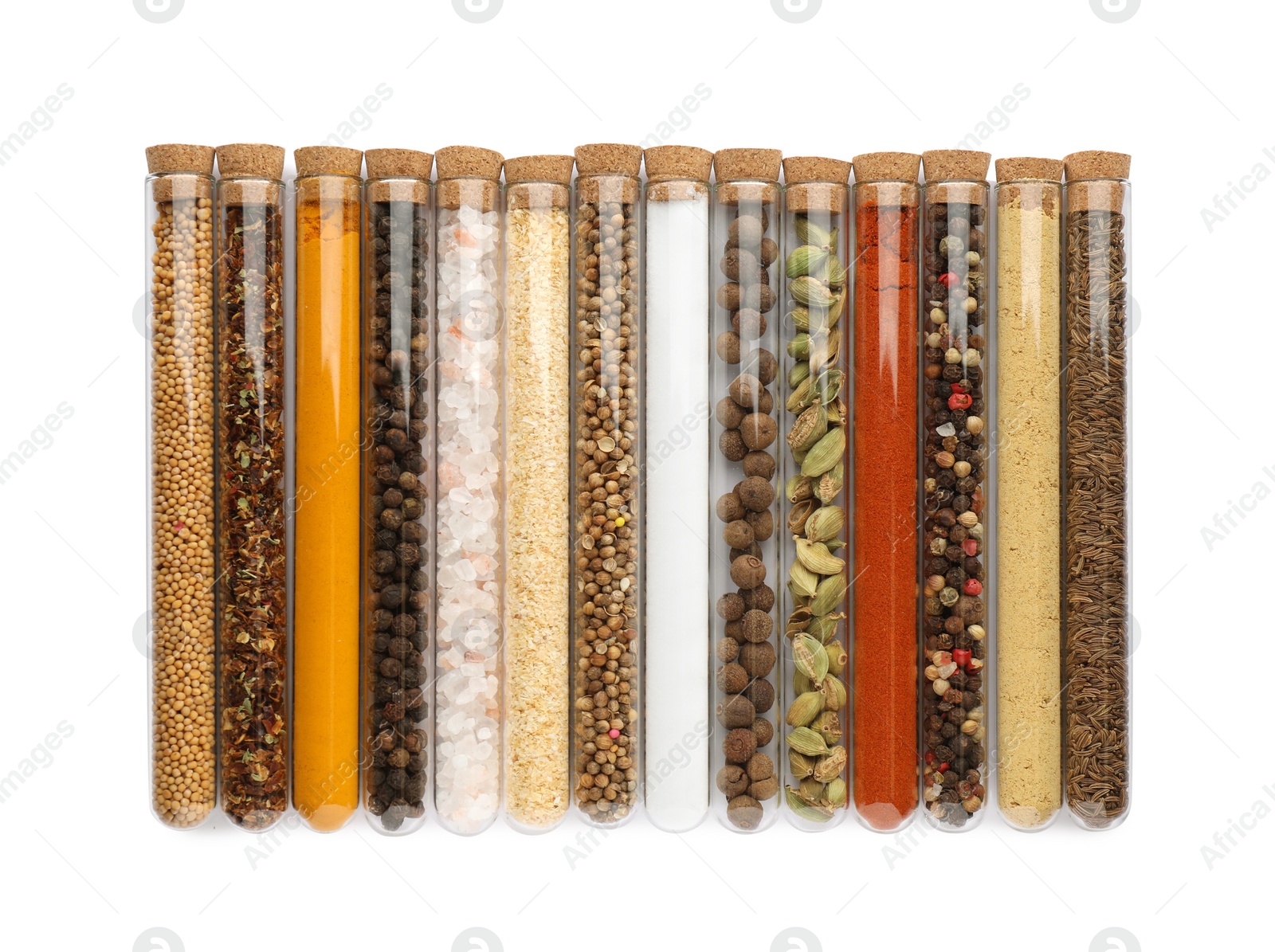 Photo of Glass tubes with different spices on white background, top view