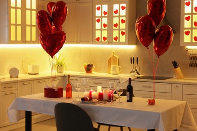 Romantic atmosphere. Cosy kitchen with set table decorated for Valentine day