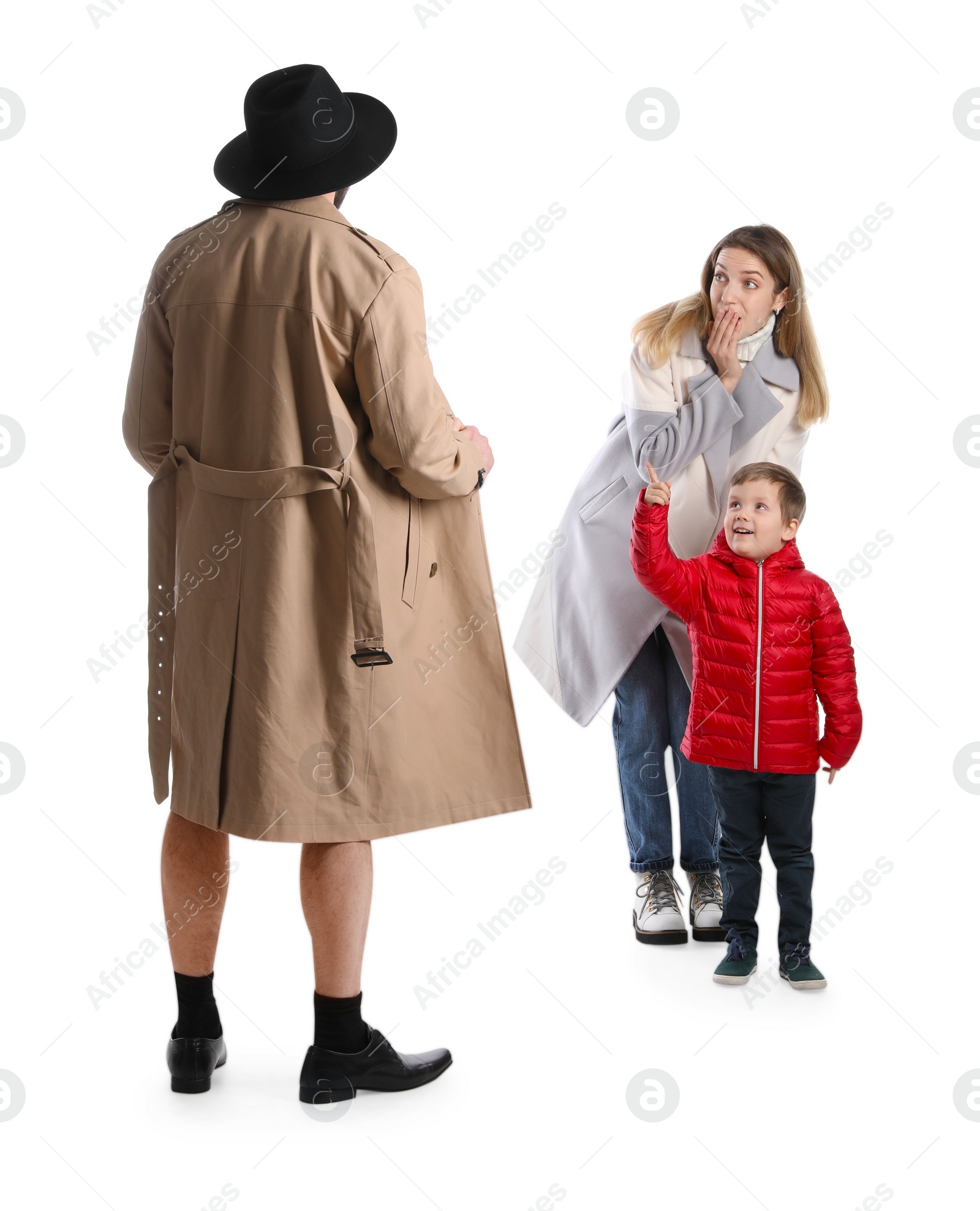 Photo of Exhibitionist exposing naked body under coat in front of mother with child isolated on white