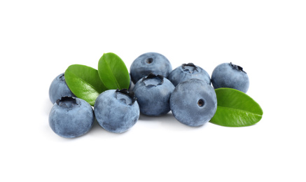 Fresh ripe blueberries with leaves on white background