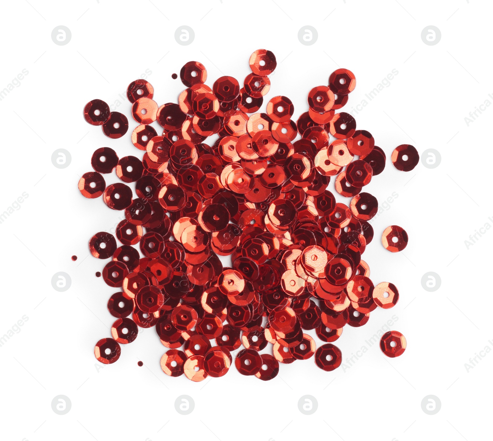 Photo of Pile of red sequins isolated on white, top view