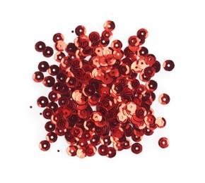 Pile of red sequins isolated on white, top view
