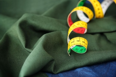 Photo of Measuring tape for tailoring on fabric