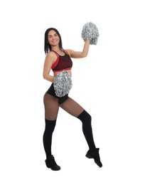 Beautiful cheerleader in costume holding pom poms on white background