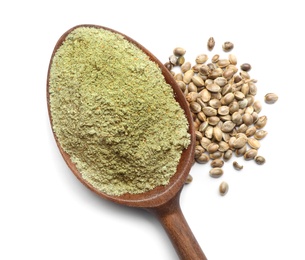 Photo of Spoon of hemp protein powder and seeds isolated on white, top view