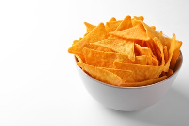 Photo of Tortilla chips (nachos) in bowl on white background