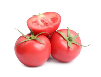 Whole and cut red tomatoes on white background