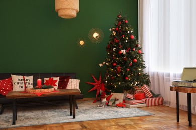 Cozy living room with Christmas tree and festive decor. Interior design