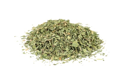 Photo of Heap of dried parsley on white background