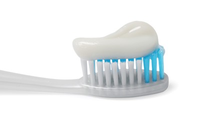 Photo of Plastic toothbrush with paste on white background, closeup