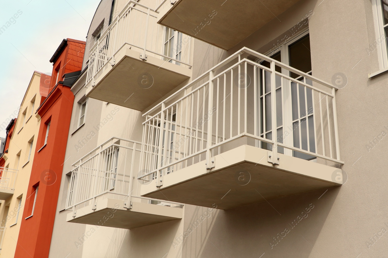 Photo of Exterior of beautiful building with empty balconies