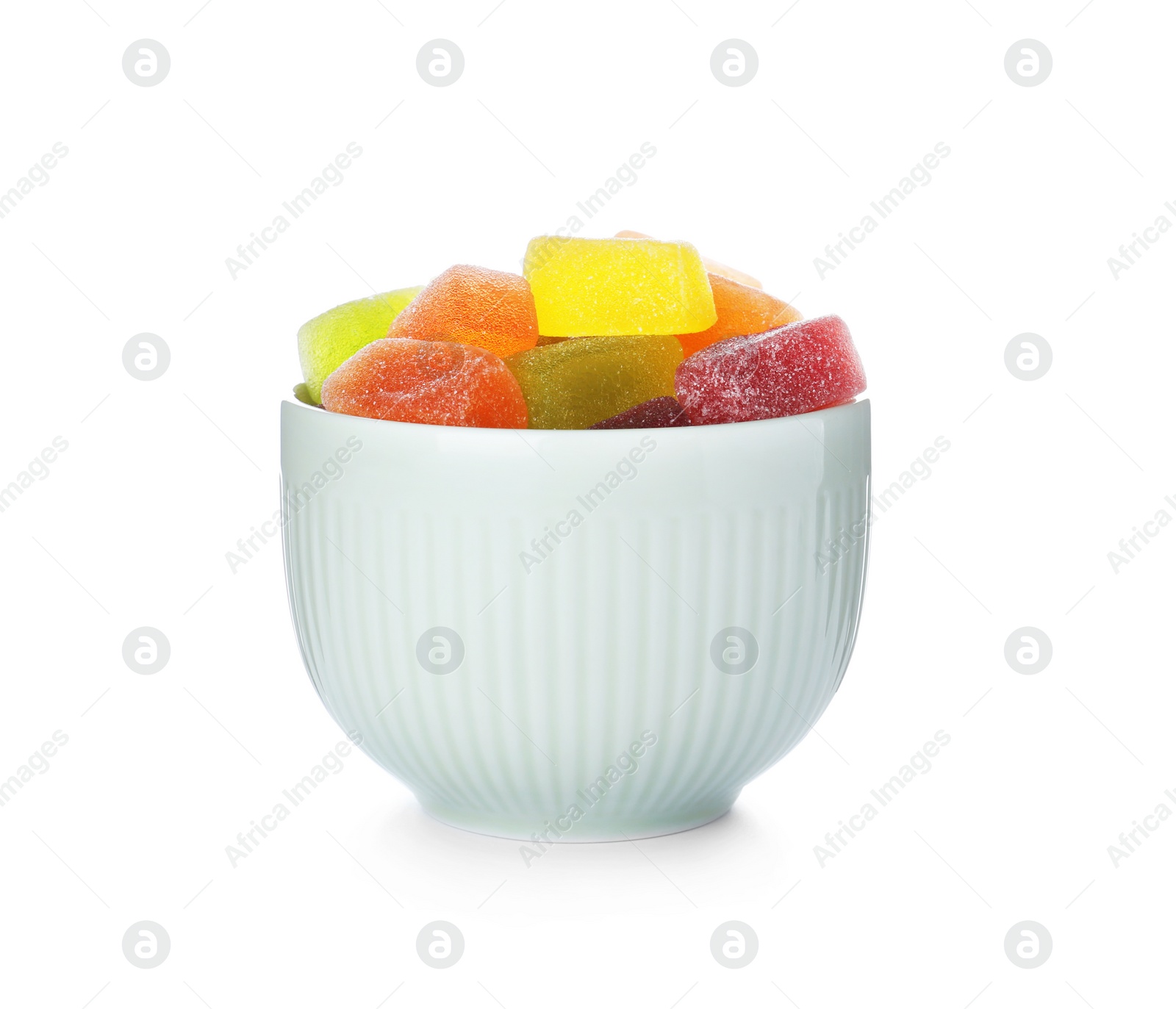 Photo of Bowl of delicious jelly candies on white background