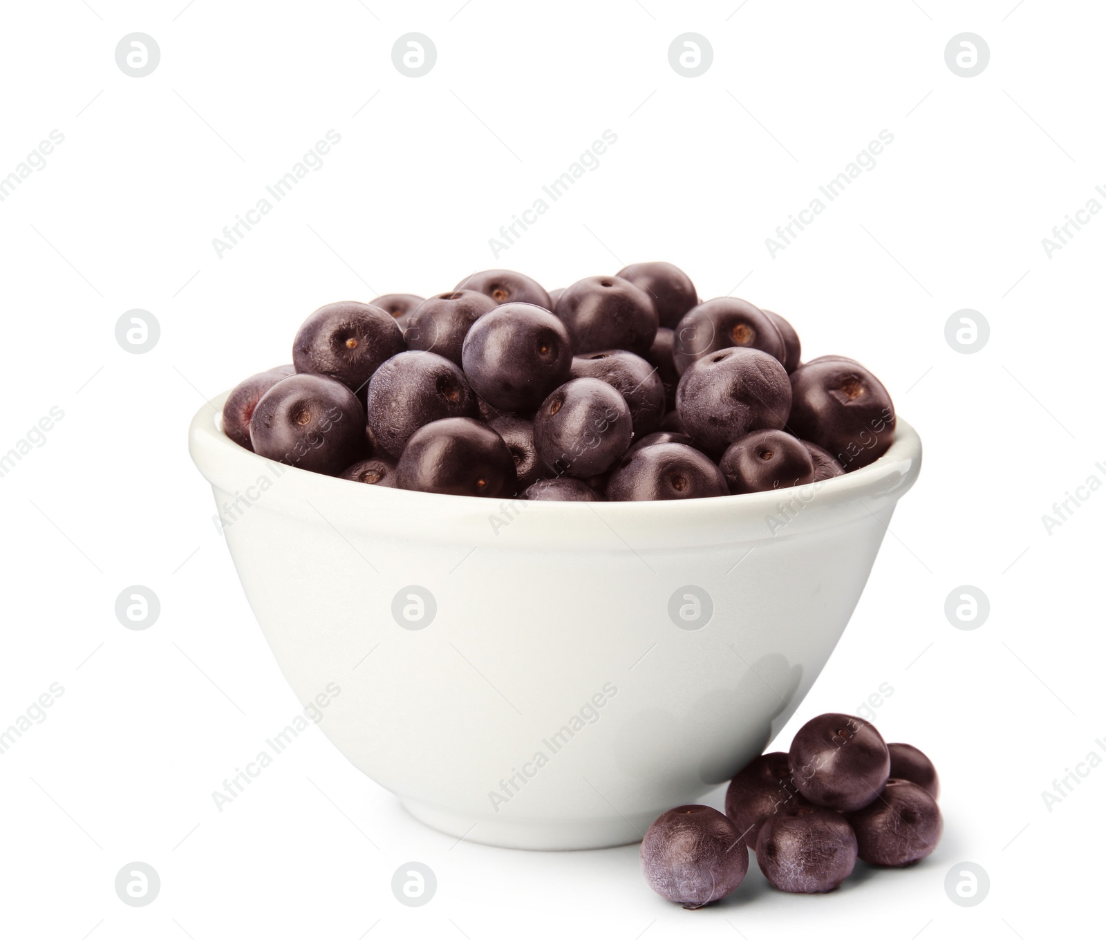 Photo of Bowl with fresh acai berries on white background