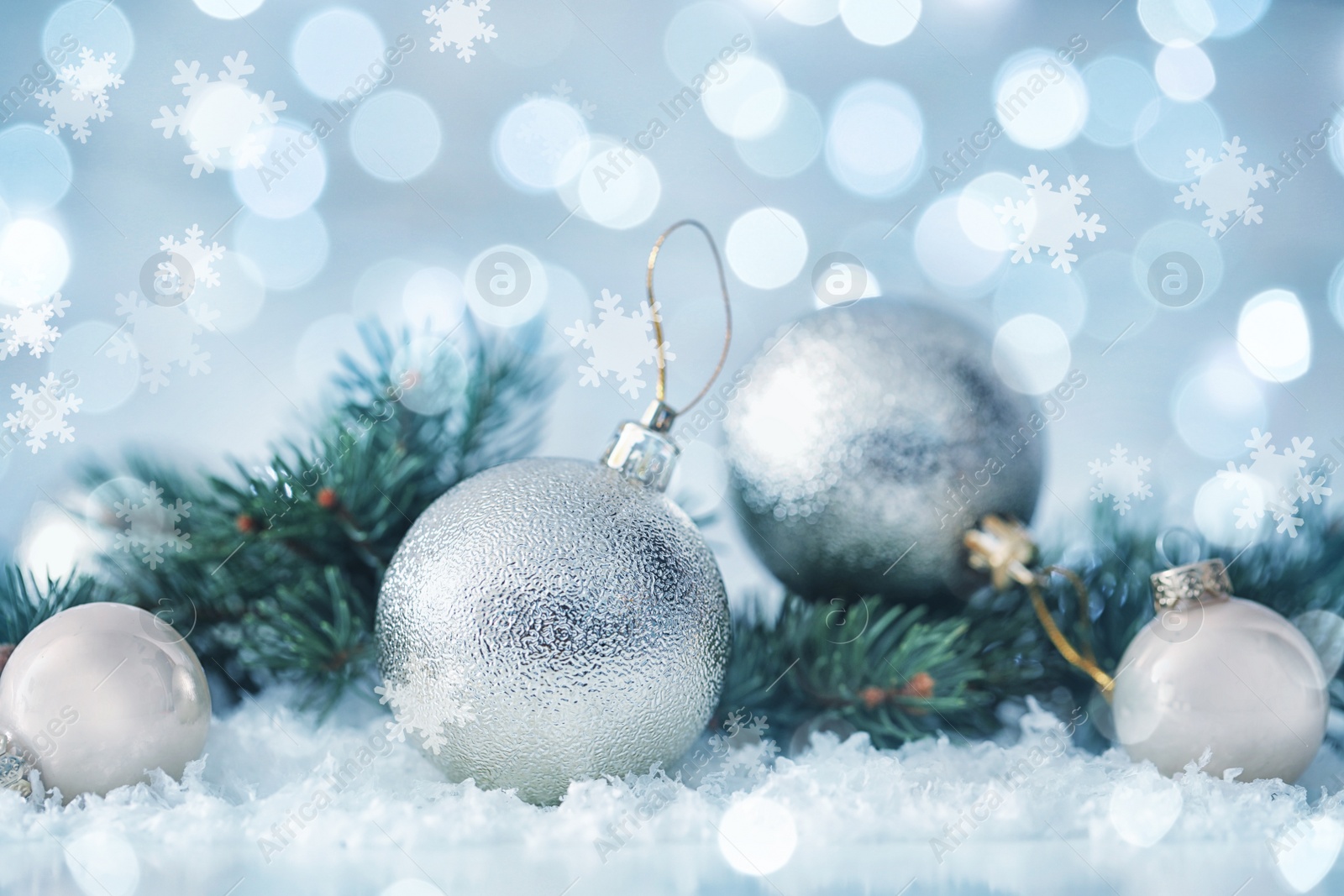 Image of Greeting card design with beautiful Christmas balls and snowflakes, bokeh effect