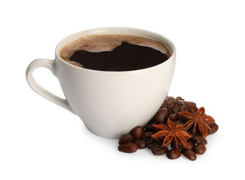 Photo of Cup of aromatic coffee with anise stars and beans on white background