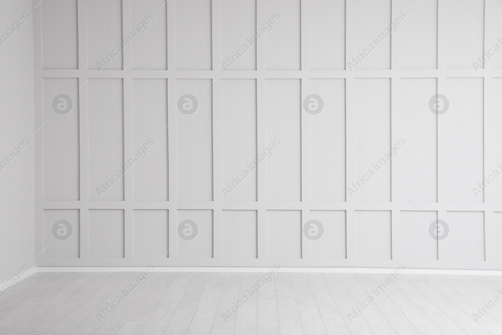 Photo of Empty room interior with white wall and floor