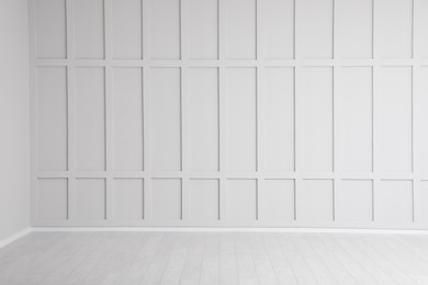 Photo of Empty room interior with white wall and floor