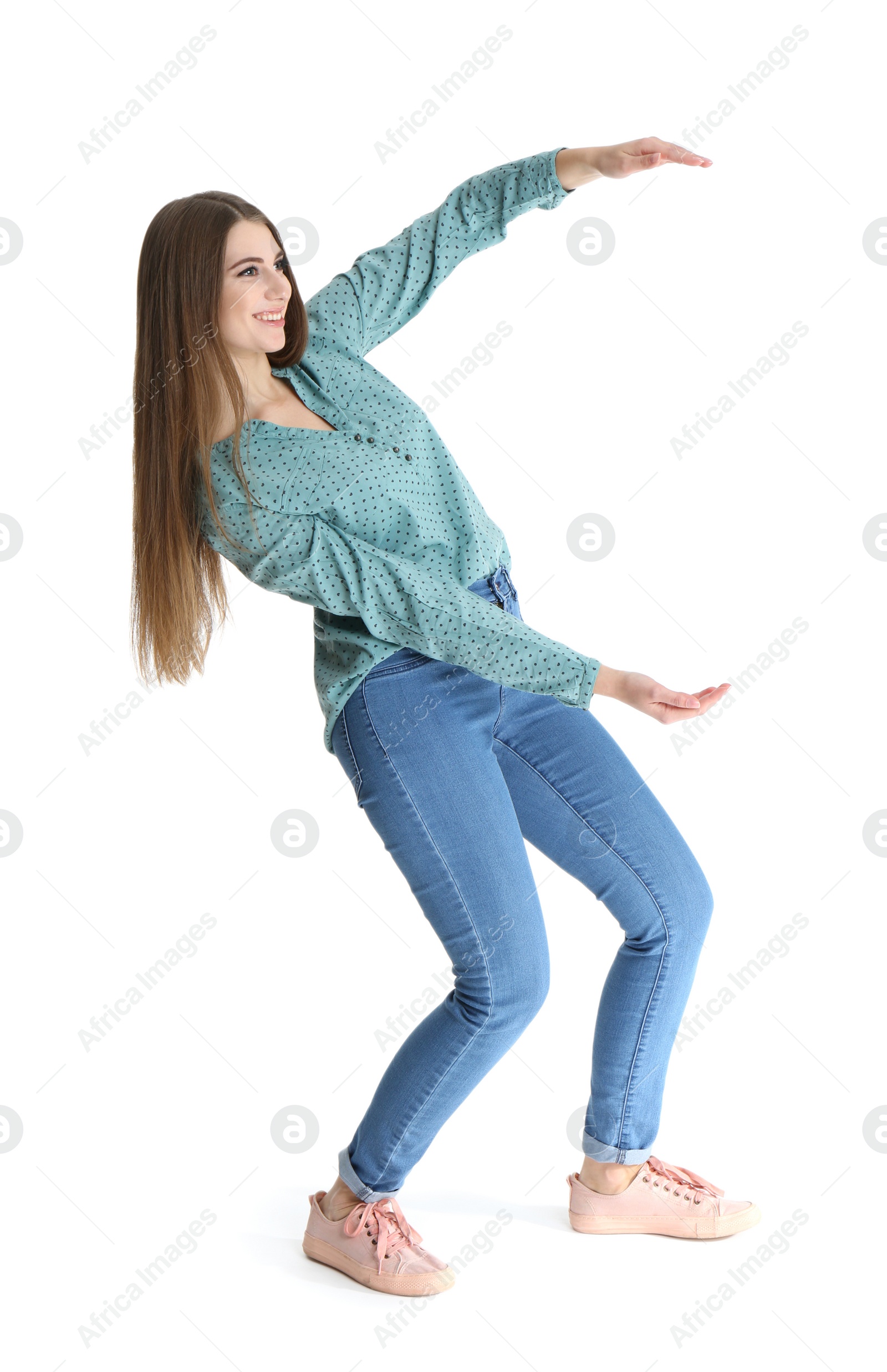 Photo of Young woman with magnet attracting people on white background