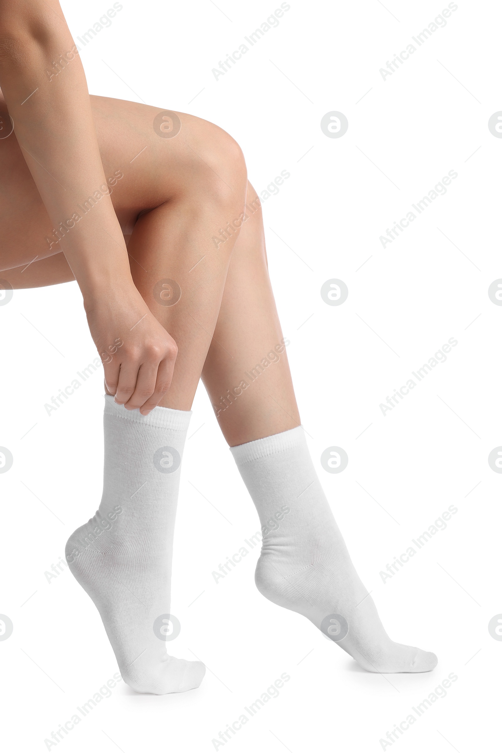 Photo of Woman in stylish socks on white background, closeup