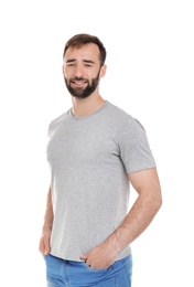 Young man in t-shirt on white background. Mockup for design