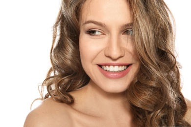 Photo of Portrait of beautiful young woman with shiny wavy hair on white background, closeup