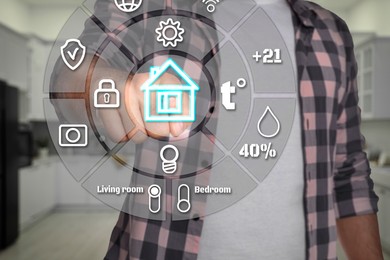Image of Smart home system. Man using digital interface in room, closeup