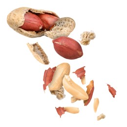 Image of Peanuts and crushed pod in air on white background