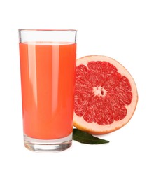 Photo of Tasty grapefruit juice in glass, fresh fruit and green leaf isolated on white