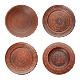 Image of Set with clay plates on white background, top view
