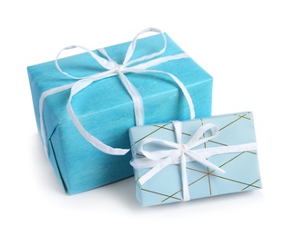 Photo of Beautiful gift boxes with ribbons on white background