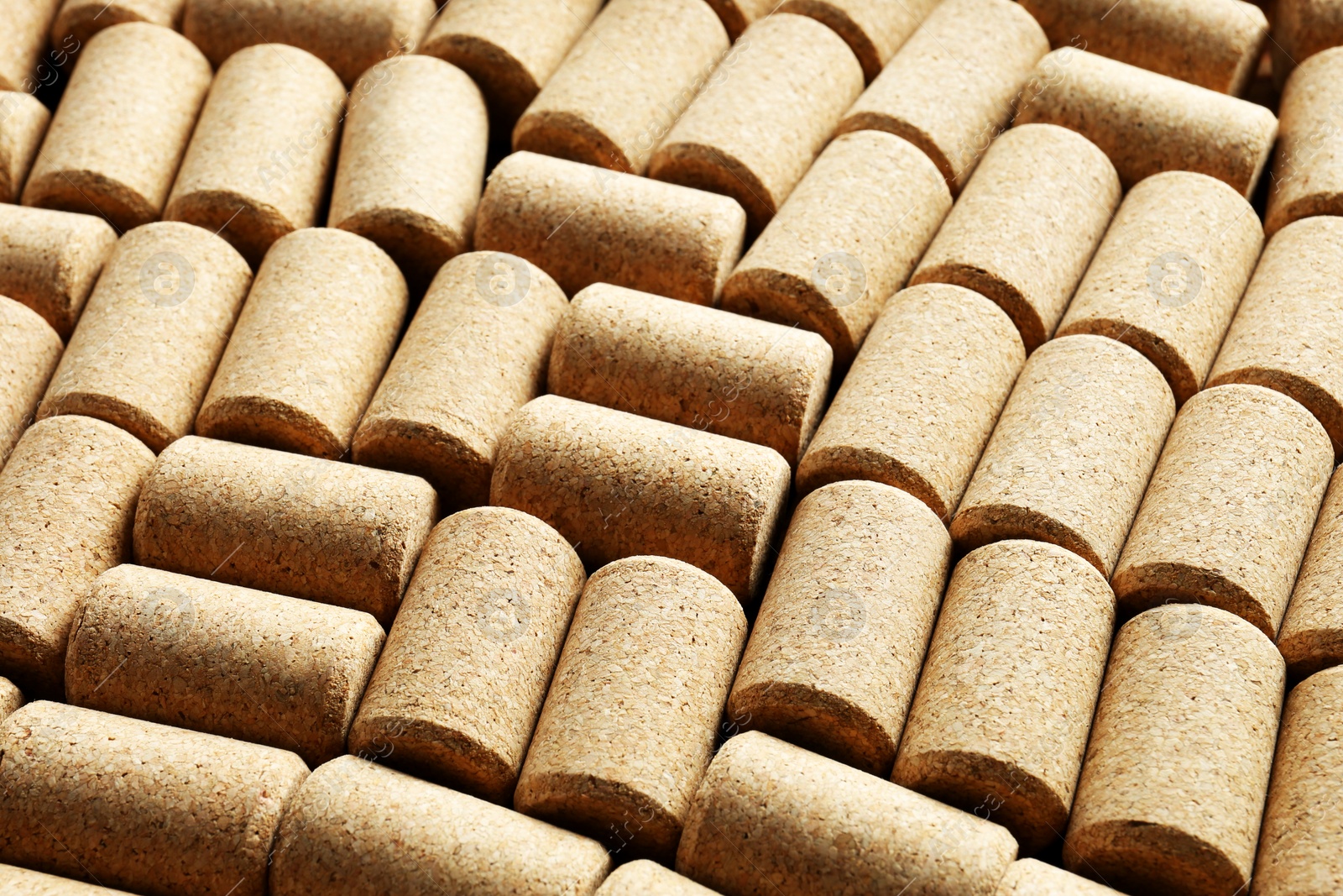 Photo of Many corks of wine bottles as background, closeup