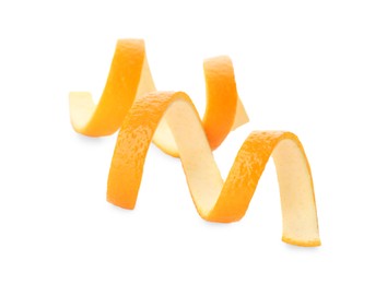 Fresh orange fruit peels on white background