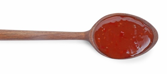 Spicy chili sauce in spoon isolated on white, top view