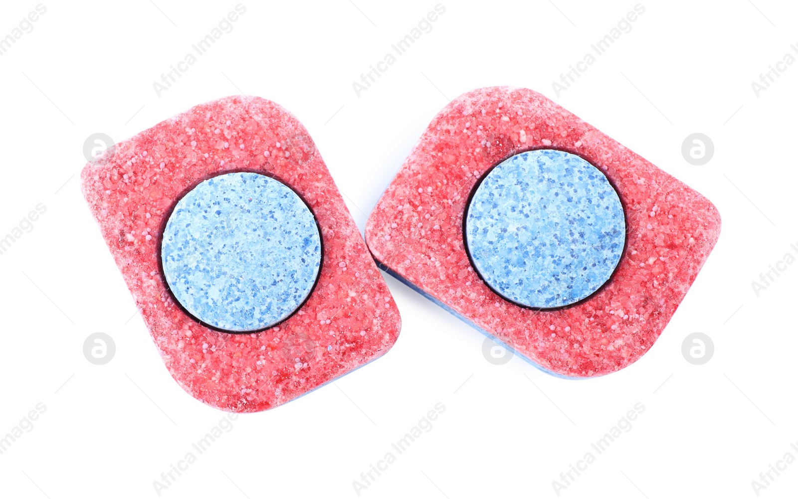 Photo of Two dishwasher detergent tablets on white background, top view