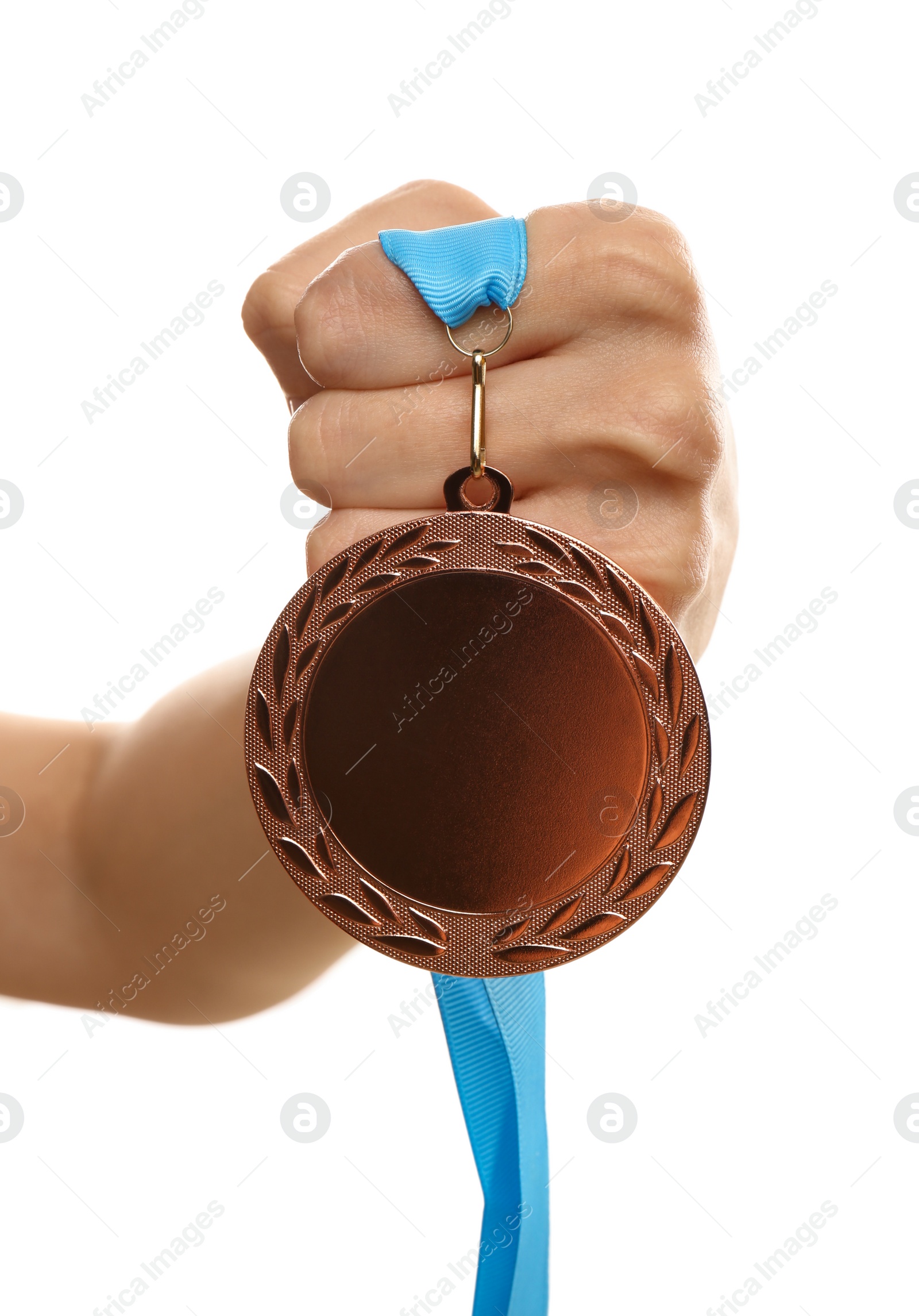 Photo of Woman holding bronze medal on white background, closeup. Space for design