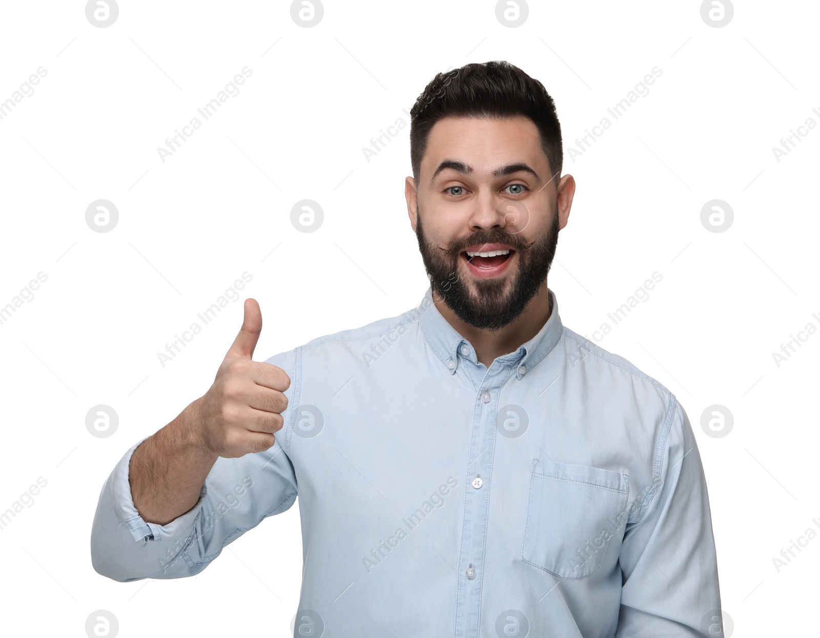 Photo of Happy young man with mustache showing thumb up on white background