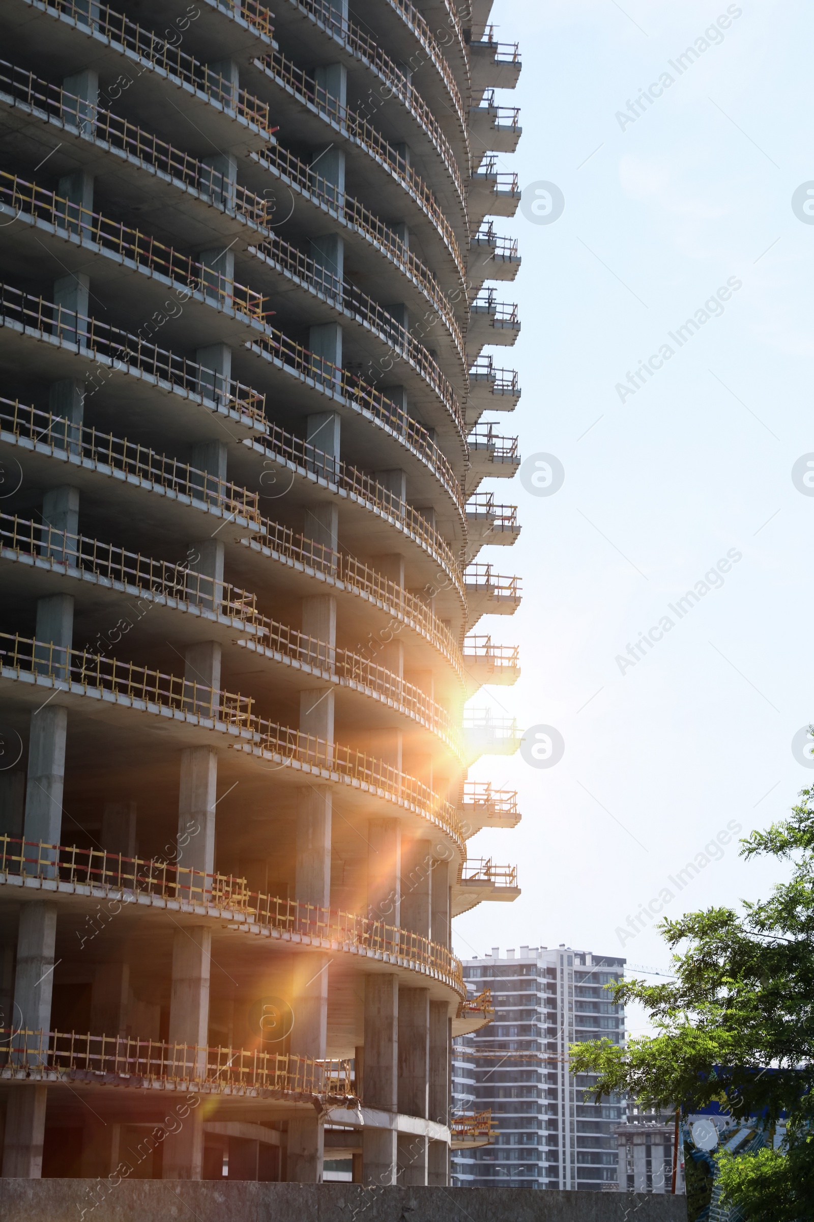 Photo of Construction site with unfinished building on sunny day