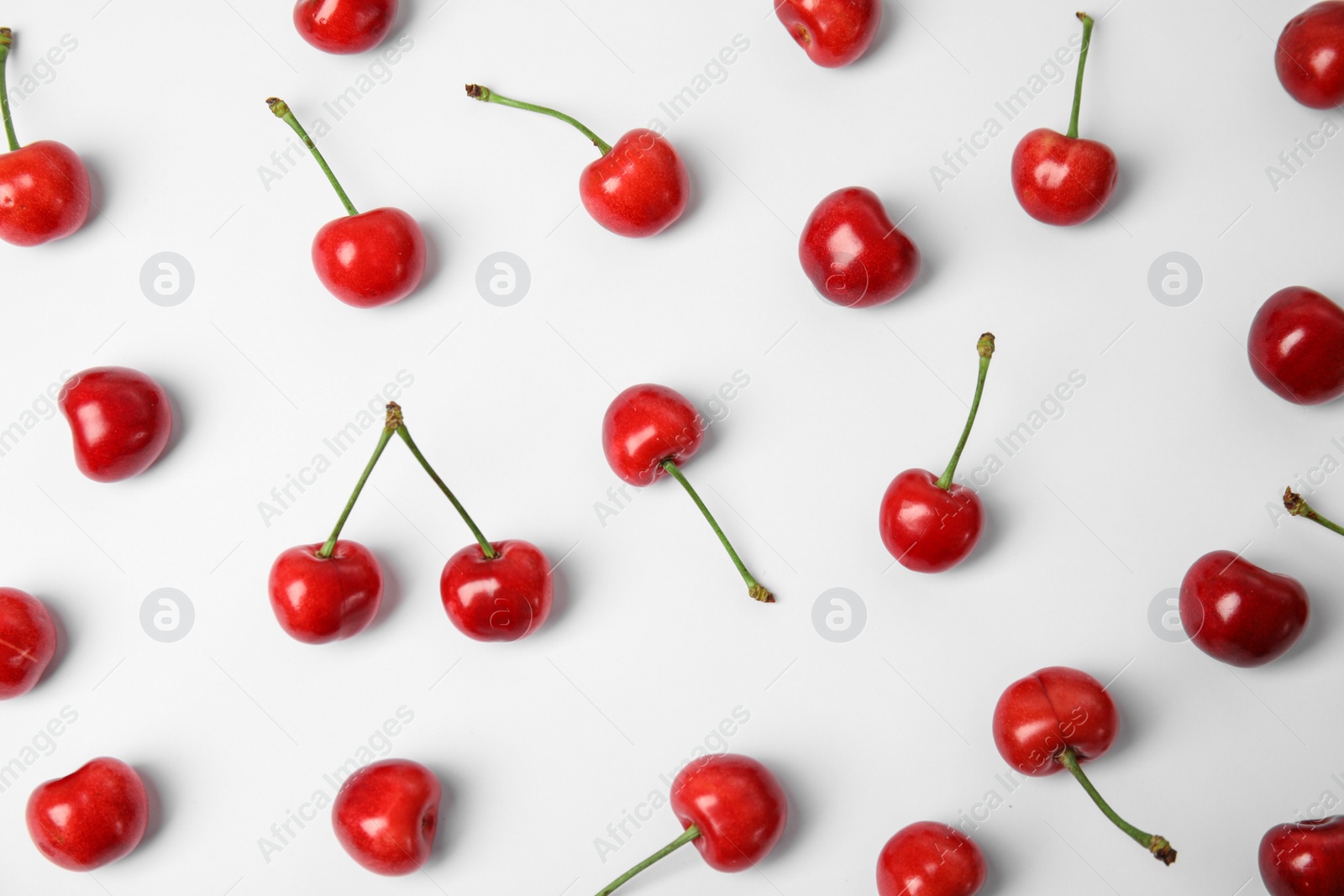 Photo of Sweet red cherries on white background