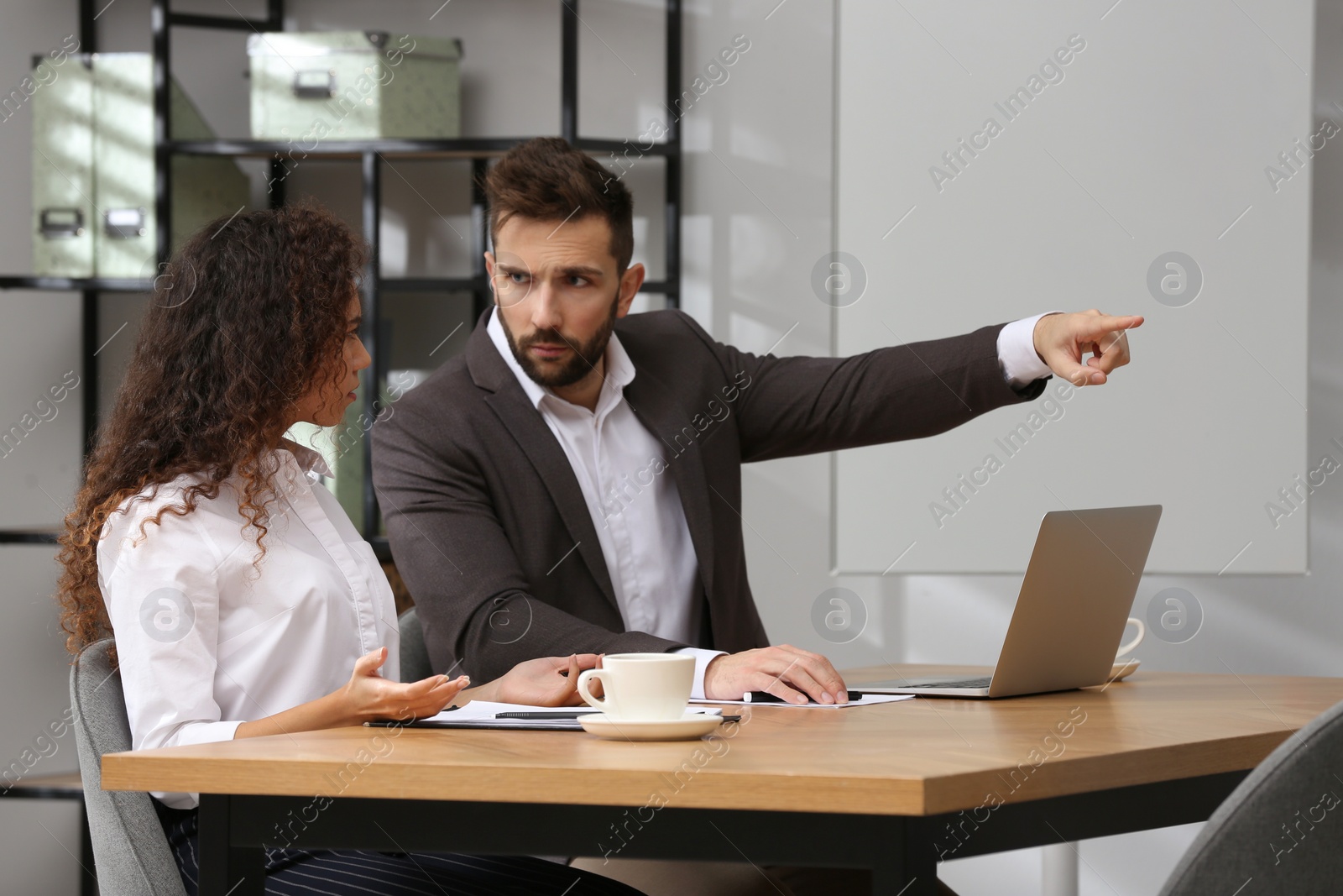 Photo of African American woman suffering from racial discrimination at work